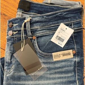 Buckle Black skinny jeans